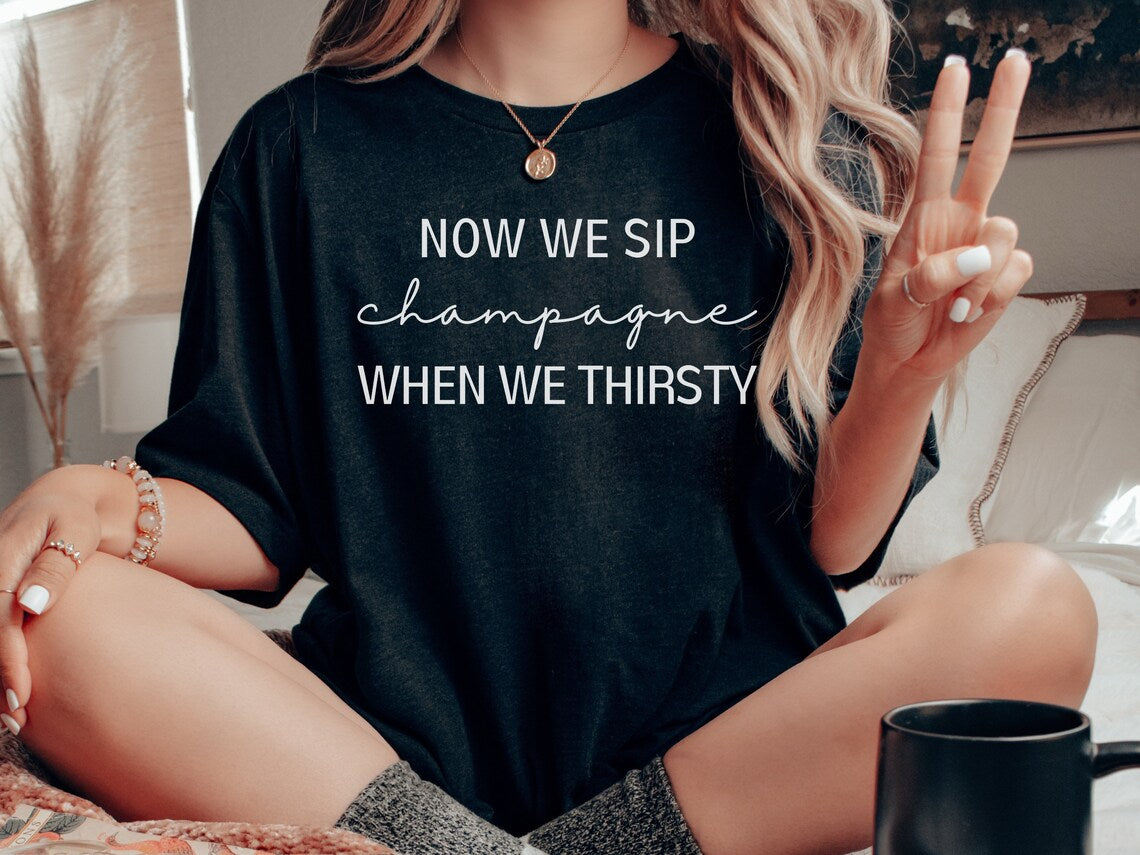 Now We Sip Champagne Graphic Tee